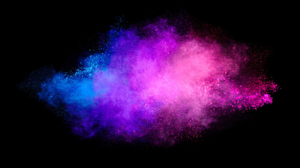Pink and blue powder cloud colour burst abstract background